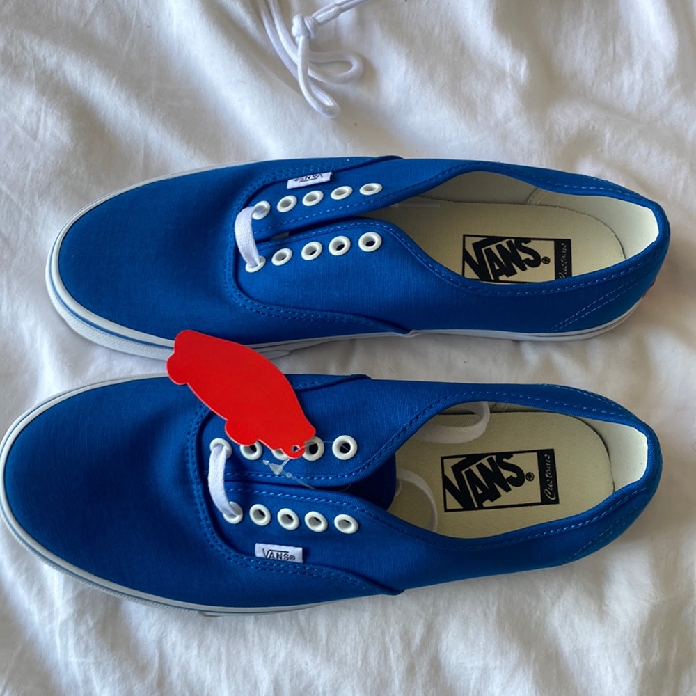 BRAND NEW VANS! NEVER WORN! Bright baby blue, size 9.5 mens, 11 womens.